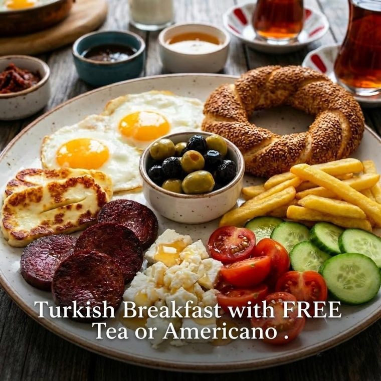 Turkish breakfast plate for sharing, with tea