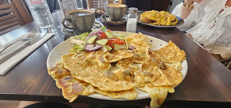 Loaded nachos with salad and jalapenos